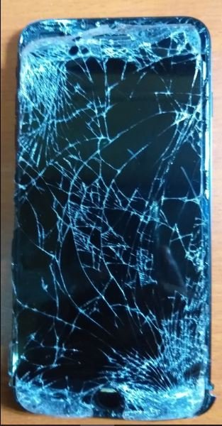 Severely shattered iPhone screen brought in for repair — iPhone screen replacement service in Kashmiri Gate by Solutionhubtech